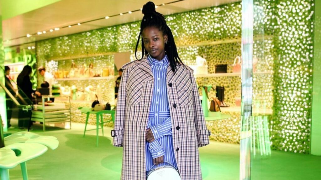 Amanda Gorman in a fancy restaurant with white lights