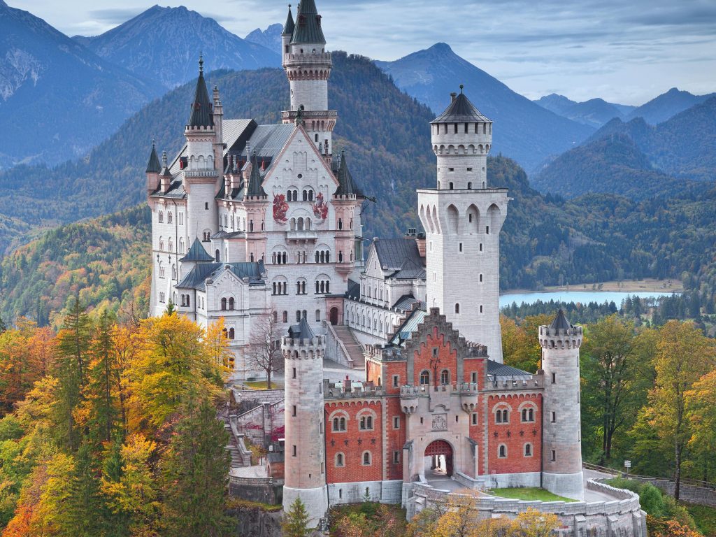 a large castle built in the middle of the forest