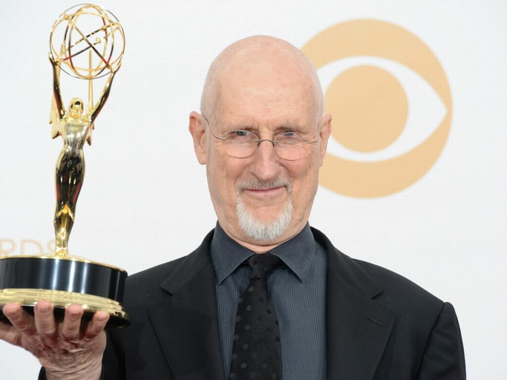 James Cromwell holding an award