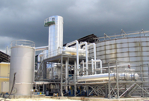 a forced circulation evaporator with different tubes and pipes connected together 