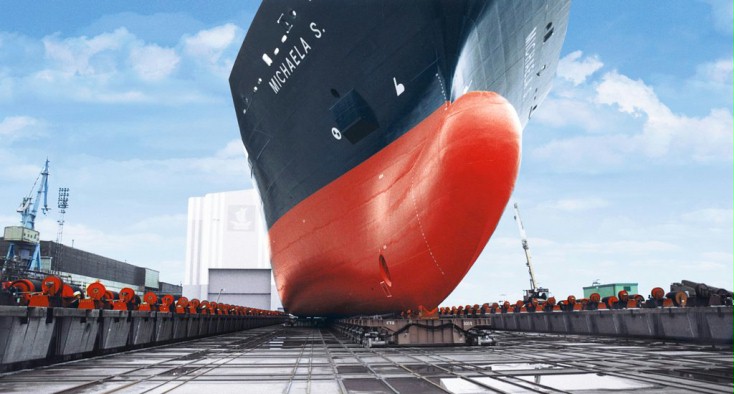 a huge red and black color ship 